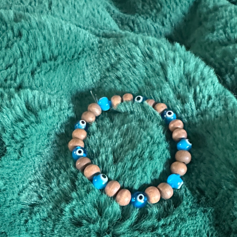 Wood snd blue evil eye Bracelet